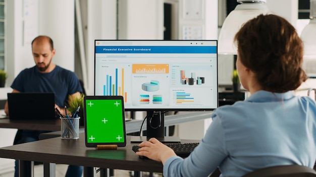 Side-by-side comparison of CRM software features displayed on a monitor